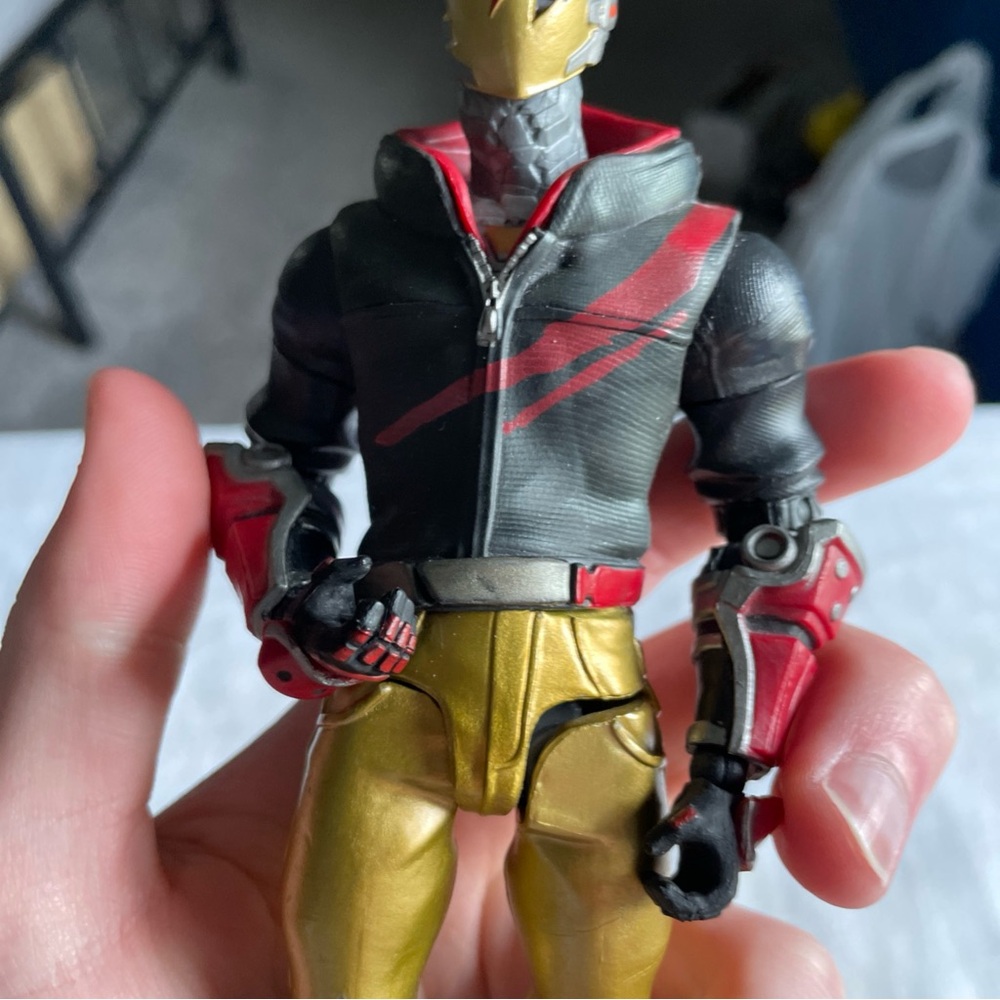 Gold & Red Masked Action Figure with Black Jacket From Fortnite - Picture 6 of 8